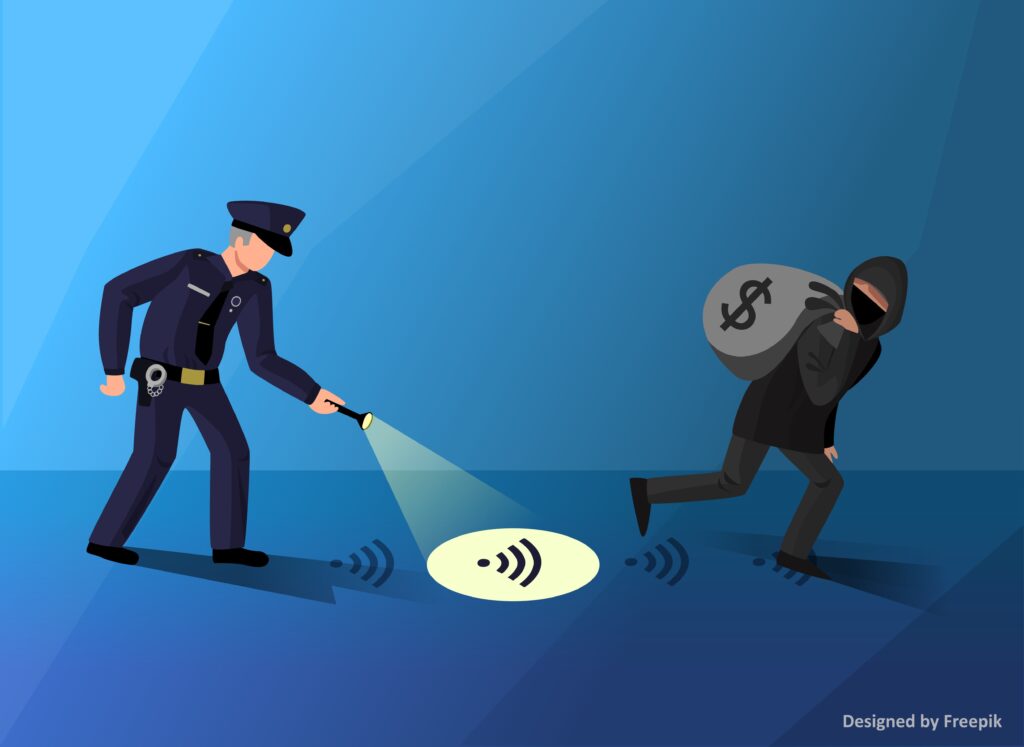 Image showing police officer looking for cybercriminal.