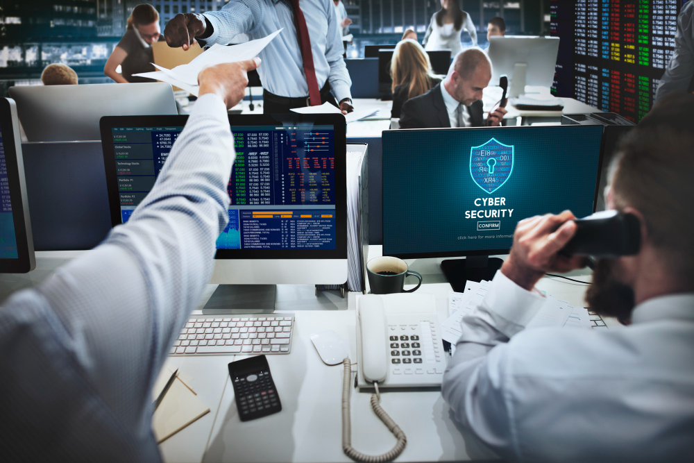 Image of group of cybersecurity experts monitoring activites